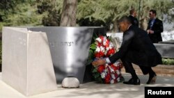 U.S. President Barack Obama lays a wreath at the grave of former Israeli Prime Minister Yitzhak Rabin at Mt. Herzl in Jerusalem on March 22.