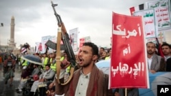 Huthi supporters attend a rally in support of Palestinians in the Gaza Strip and against the U.S. government designating Huthis as a terrorist group in Sanaa, Yemen, on January 19.