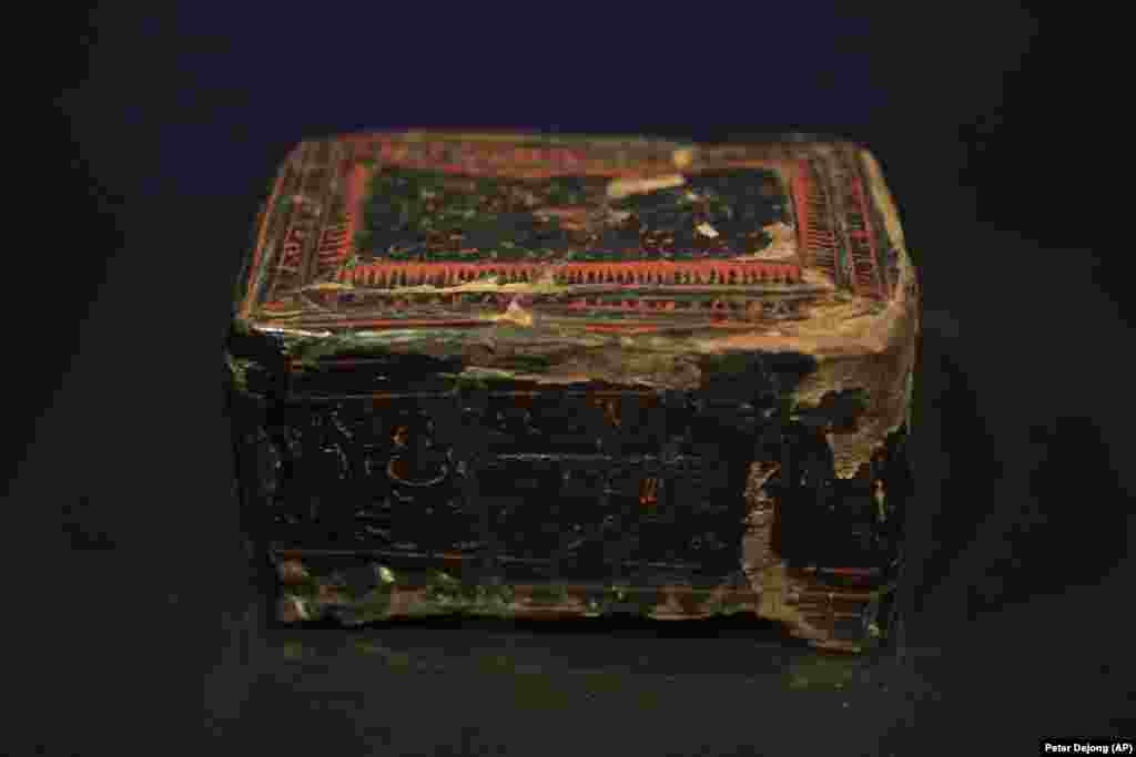 A Chinese lacquer box from the first century A.D., a burial gift for a Scythian woman