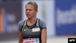 Yulia Stepanova walks on the track as she was injured during the 800-meter race of the European Athletics Championships at the Olympic Stadium in Amsterdam in July 2016.