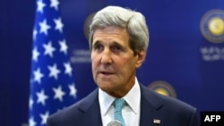 U.S. Secretary of State John Kerry addresses the media prior to his meeting with the Turkish foreign minister in Ankara on September 12.