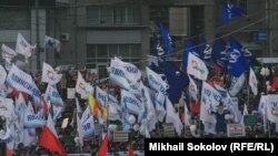 Protesters gather with balloons and placards during an opposition demonstration in Moscow on February 4.