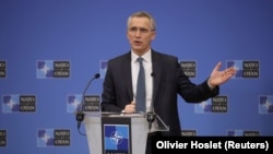 NATO Secretary-General Jens Stoltenberg gives a news conference ahead to a NATO defense ministers council at the alliance headquarters in Brussels on February 15