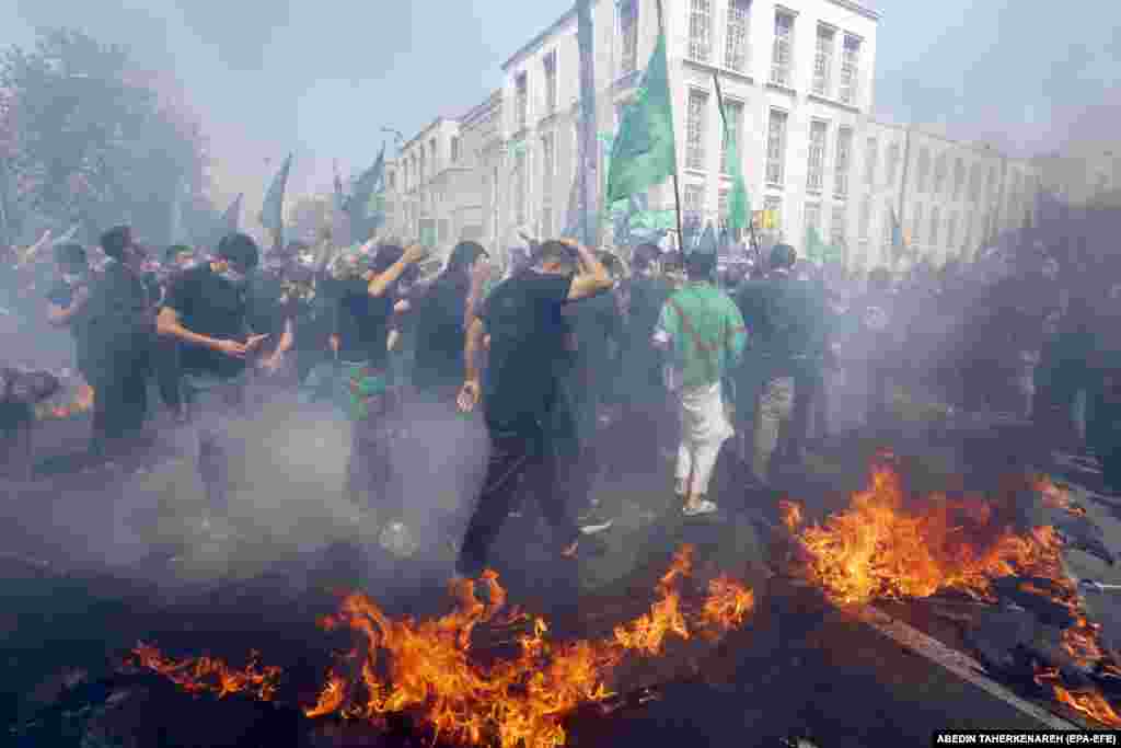 Many believers wore masks to prevent the spread of the coronavirus during reenactments.