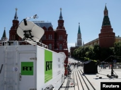 A vehicle of Russia's state-controlled RT network broadcasting from near the Kremlin in 2018