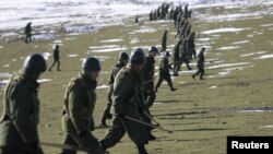 Russian servicemen at Russia's military base outside Dushanbe