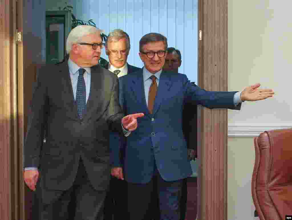 Akhmetov, despite serving as a parliament deputy, rarely embraces political roles, and most recently turned down the job of governing the Donetsk region. In his place, he recommended a political nemesis, Serhiy Taruta, a Tymoshenko ally and a longstanding voice for Ukrainian unity. Taruta (right) meets with German Foreign Minister Frank-Walter Steinmeier in Donetsk on March 22.&nbsp;