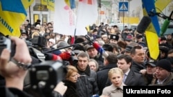 Yulia Tymoshenko speaks to the press on her way to the Prosecutor-General's Office in Kyiv.