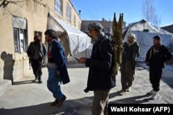 Militiamen loyal to Abdul Ghani Alipur, a local warlord, in the Behsud district of Maidan Wardak Province.