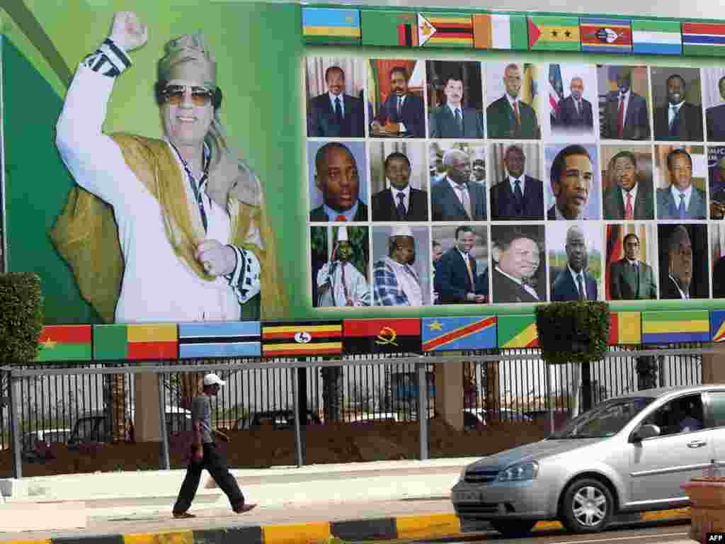 This billboard shows Qaddafi with other African leaders in the Libyan coastal city of Sirte, before the start of the Arab League Extraordinary Summit in October 2010.