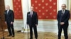 Russian President Vladimir Putin (center), Azerbaijani President Ilham Aliyev (left), and Armenian Prime Minister Nikol Pashinian at an earlier trilateral meeting in Moscow in January. 