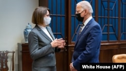 Belarusian opposition leader Svyatlana Tsikhanouskaya (left) meets with U.S. President Joe Biden at the White House on July 28.