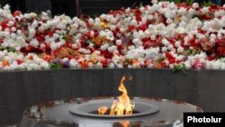 Thousands pay tribute to Armenians killed in the Ottoman massacres at the Armenian Genocide Memorial in Yerevan on April 24.