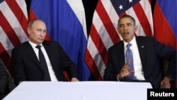 Russian President Vladimir Putin (left) and U.S. President Barack Obama during a June 2012 meeting in Los Cabos, Mexico