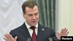 Russian President Dmitry Medvedev gestures during a speech at an awards ceremony devoted to achievements in the space programme in Moscow, 12Apr2011