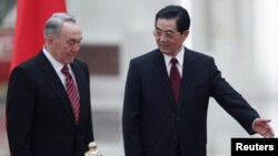 Kazakh President Nursultan Nazarbaev (left) visited his Chinese counterpart Hu Jintao in Beijing in February.