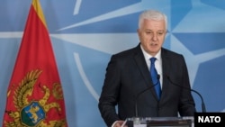 Montenegrin Prime Minister Dusko Markovic will officially make Montenegro the 29th NATO member. 