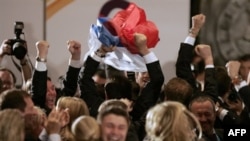 The Russian delegation cheers Sochi's selection in July 2007 to host the 2014 Winter Olympics.