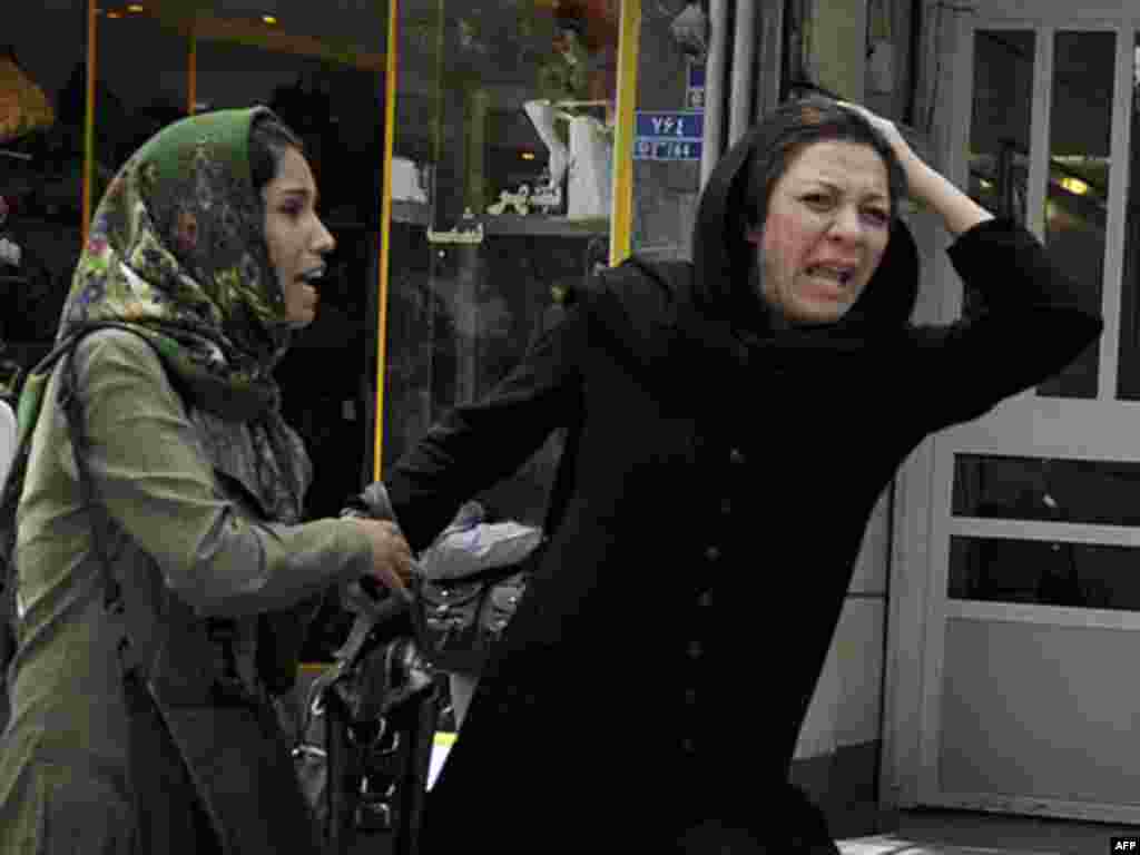 A day after the vote, a woman cries near Musavi's campaign headquarters in Tehran.