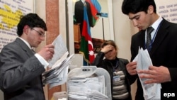 Azerbaijani officials say 90 percent of voters approved the constitutional amendments.