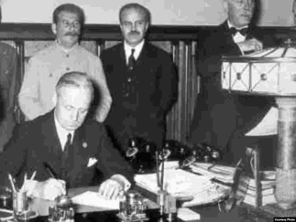 German Foreign Minister Joachim von Ribbentrop inks the agreement. - After the signing ceremony, Stalin proposed a toast: "I know how much the German people love their Fuehrer," he said. "I should therefore like to drink to his health."