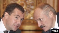 Did Russia's Dmitry Medvedev (left) get enough from Belarus's Alyaksandr Lukashenka...