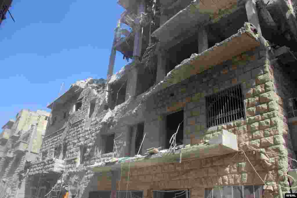 A shattered building in Aleppo&#39;s Bustan al-Qasr district on October 11. The British-based Syrian Observatory for Human Rights said around 250,000 people remained trapped in the besieged city.