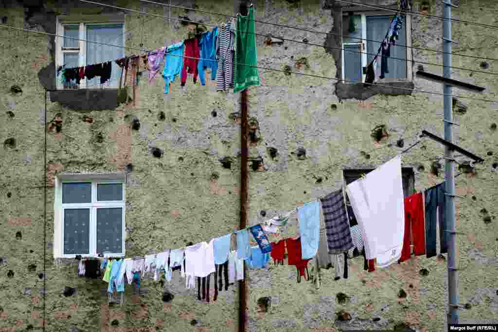 A building in Stepanakert damaged by fighting. Civilian areas of the city endured heavy shelling in 1991-1992.