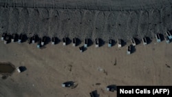 An aerial view shows coal being loaded onto trucks near a coal mine in Datong in China's northern Shanxi Province on November 2.