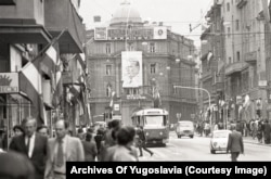 A portrait of Tito is displayed along with flags flown at half-mast in Sarajevo in May 1980.