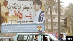 An election poster near a polling station in Baghdad