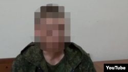 A screen grab of the video showing captured Russian soldier Major Vladimir Starkov.