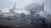 Damaged radar arrays and other equipment is seen at a Ukrainian military facility outside Mariupol on February 24.