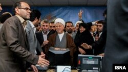 Former Iranian President Ali Akbar Hashemi Rafsanjani among supporters in Tehran