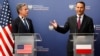 U.S. Secretary of State Antony Blinken (left) and Polish Foreign Minister Radoslaw Sikorski talk to reporters in Warsaw on September 12. 