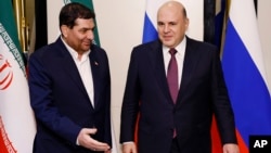 Iranian First Vice President Mohammad Mokhber (left) and Russian Prime Minister Mikhail Mishustin met in Bishkek on October 25.