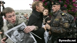 Belarusian police break up an opposition demonstration in Minsk on September 16.