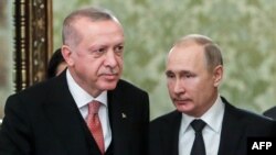 Russian President Vladimir Putin (right) and his Turkish counterpart Recep Tayyip Erdogan. (file photo)