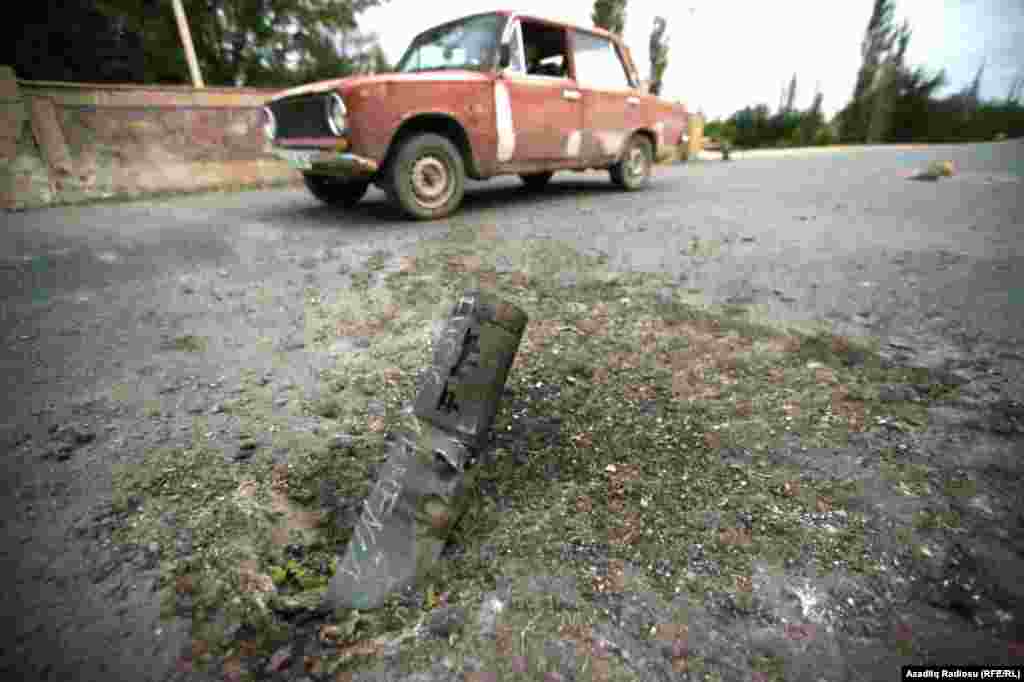 A damaged road in the Azerbaijani city of Tartar