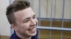 Journalist Roman Pratasevich in a defendant's cage in Minsk during a court hearing in 2017. 