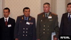 Former Uzbek Interior Minister Zakir Almatov (second from left) is shown with other Uzbek security officials in Tashkent in 2005.