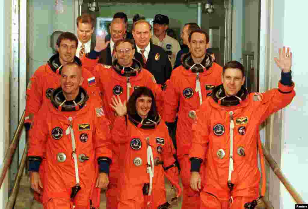 The crew of the space shuttle &quot;Endeavour&quot; departs from their crew quarters for launch pad 39A at the Kennedy Space Center in Florida, early on the morning of December 3, 1998.