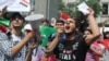 Syrian student Mughira al-Sharif demonstrates against the Assad regime in front of the Syrian Consulate in Istanbul.