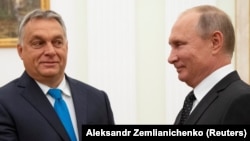 Viktor Orban's meeting with Russian President Vladimir Putin (right) comes as tensions between the West and Moscow have intensified over Russia's movement of troops to areas near its border with Ukraine. (file photo)