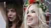 Femen activists demonstrate in front of the headquarters of the International Ice Hockey Federation in Zurich in February. They were trying to draw attention to the political situation in Belarus ahead of that country's hosting of the Hockey World Cup in 2014.