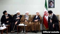 Ex-President Ali Akbar Hashemi Rafsanjani (second from right) at a meeting in 2011 with Supreme Leader Ali Khamenei (right) and members of Iran's powerful Guardians Council.