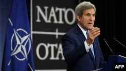 U.S. Secretary of State John Kerry at NATO headquarters in Brussels on December 6: "The change of the administration will not change the unwavering commitment of the U.S. to...our NATO obligations." 