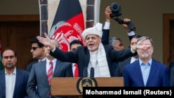 Afghan President Ashraf Ghani speaks during his inauguration in Kabul on March 9.