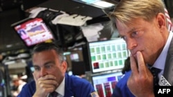 Traders on the floor of the New York Stock Exchange (file photo)