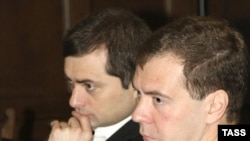 Surkov (left) and Medvedev at a meeting with political party leaders last November.